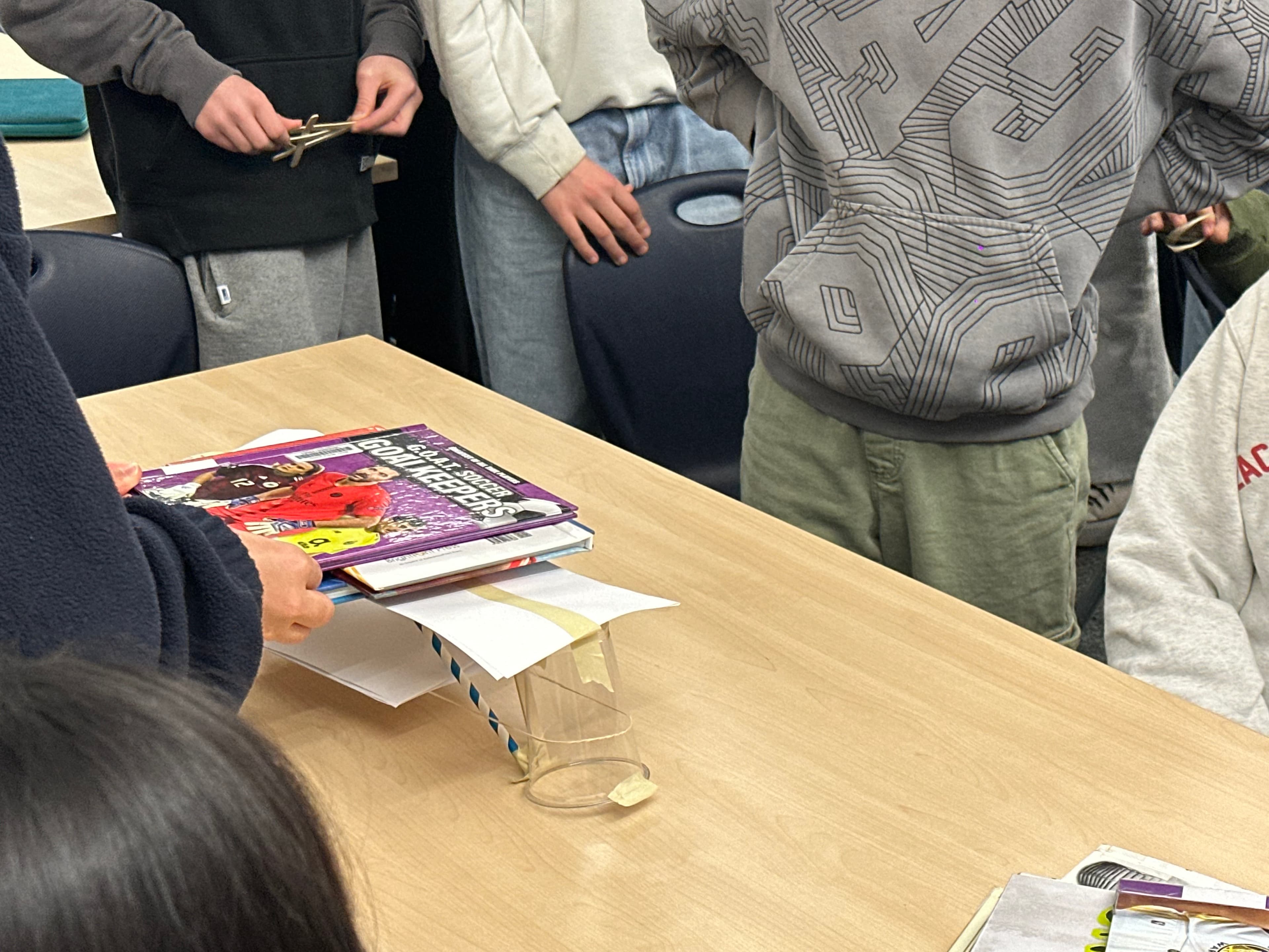 Students building bridges together